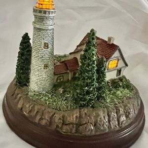 Thomas Kinkade table top "Light in the Storm" lighthouse sculpture